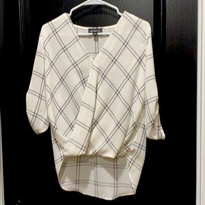 Black and white high low top.